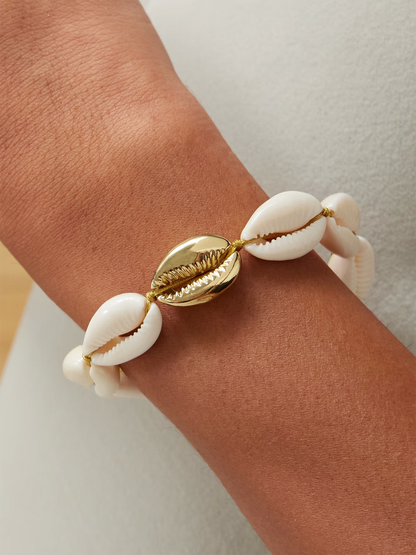 Large gold-plated shell bracelet