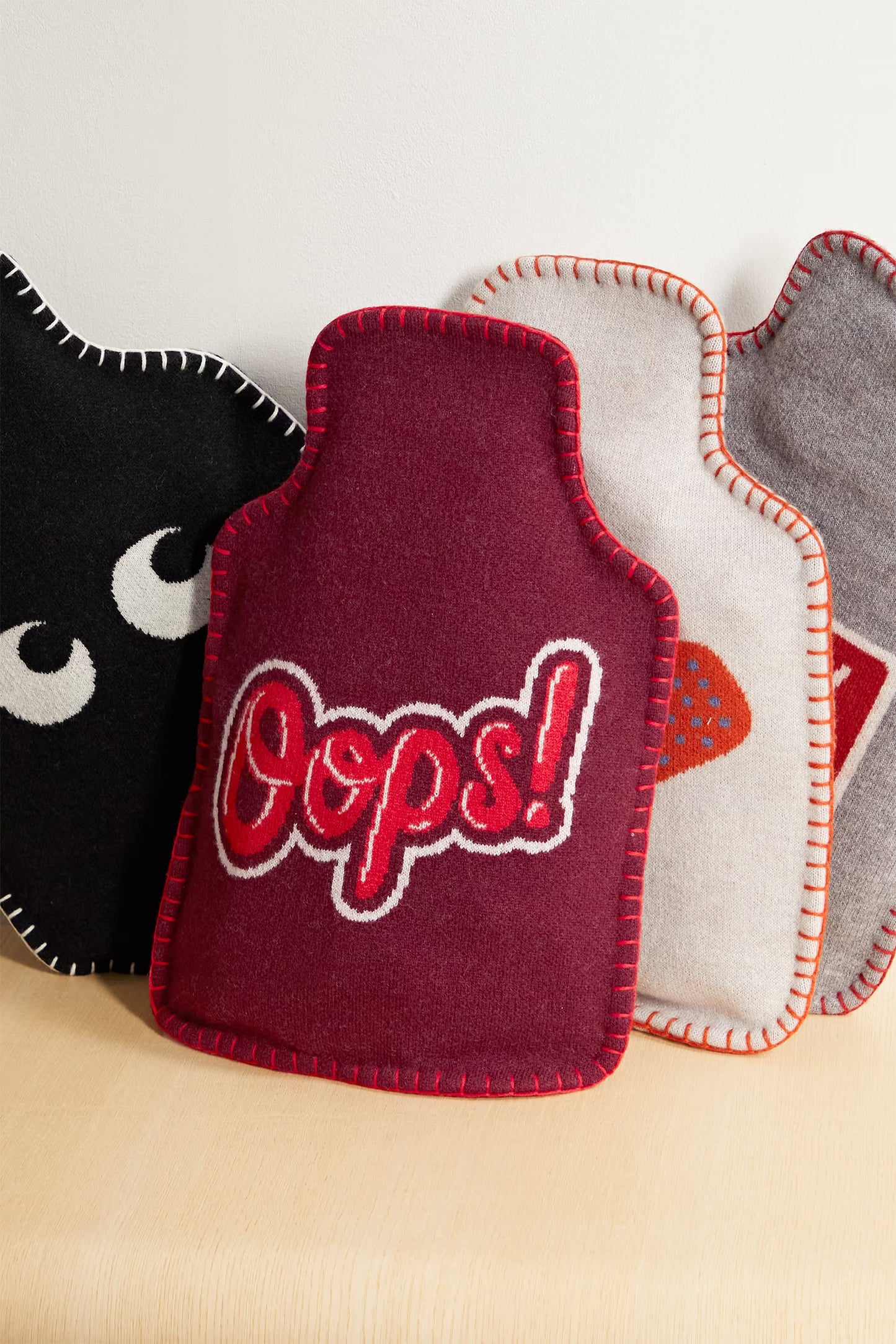 Oops! Intarsia Wool Hot Water Bottle Cover