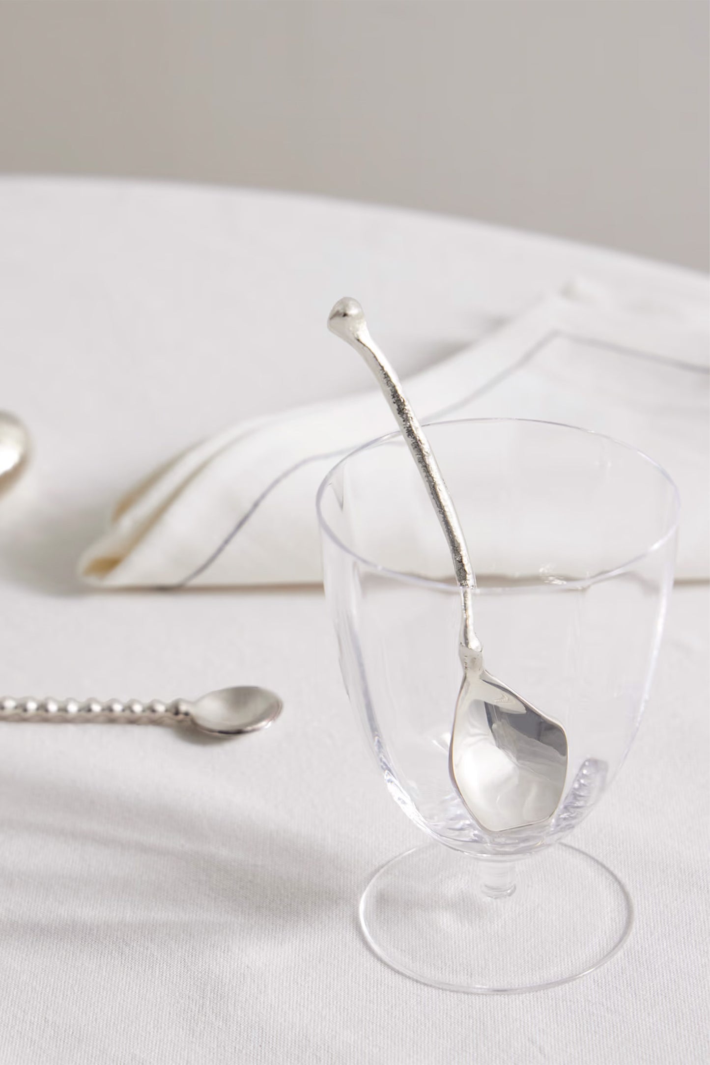 The Totemic Devotion set of four silver-plated dessert spoons