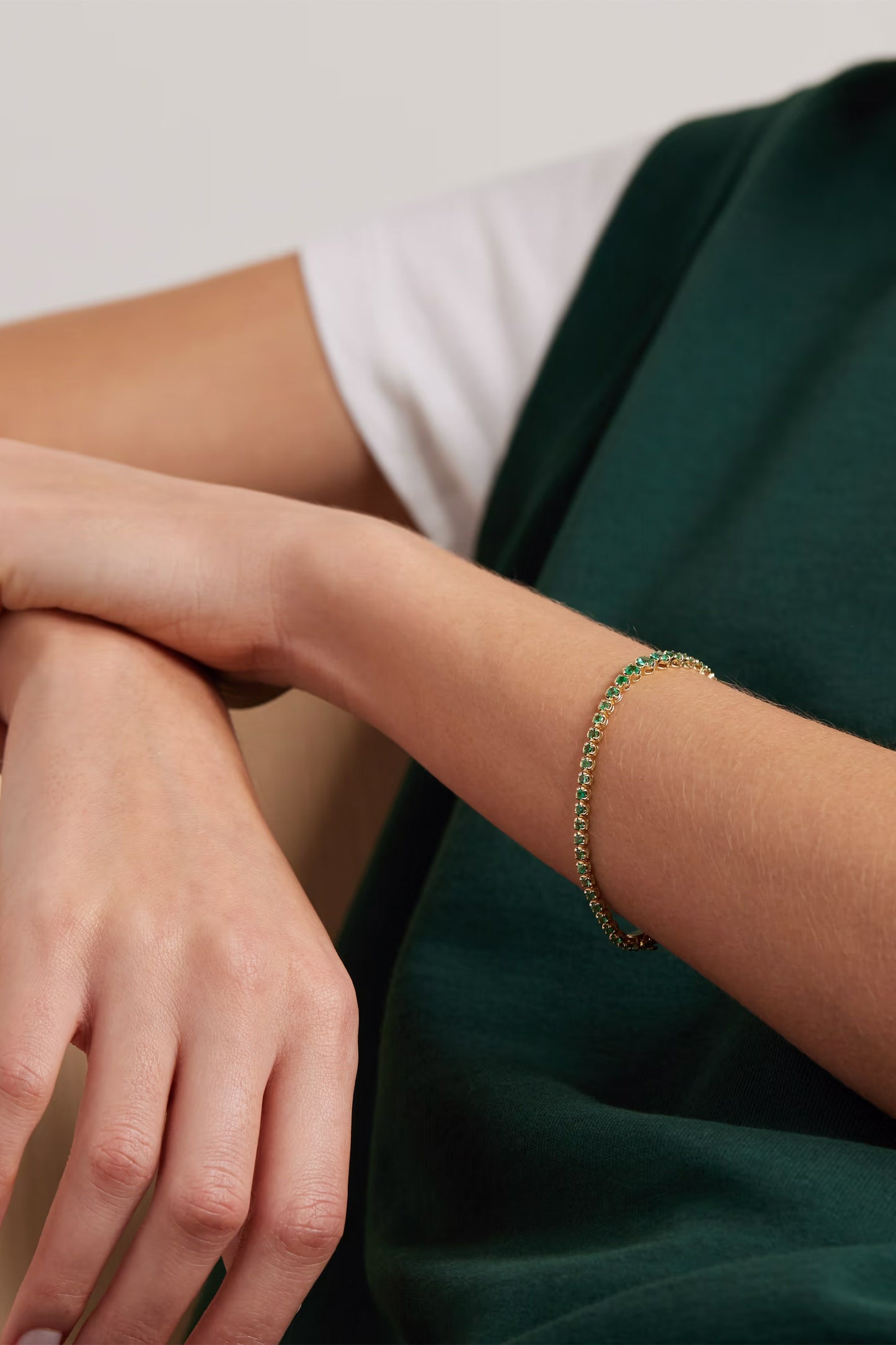 18-karat gold emerald tennis bracelet