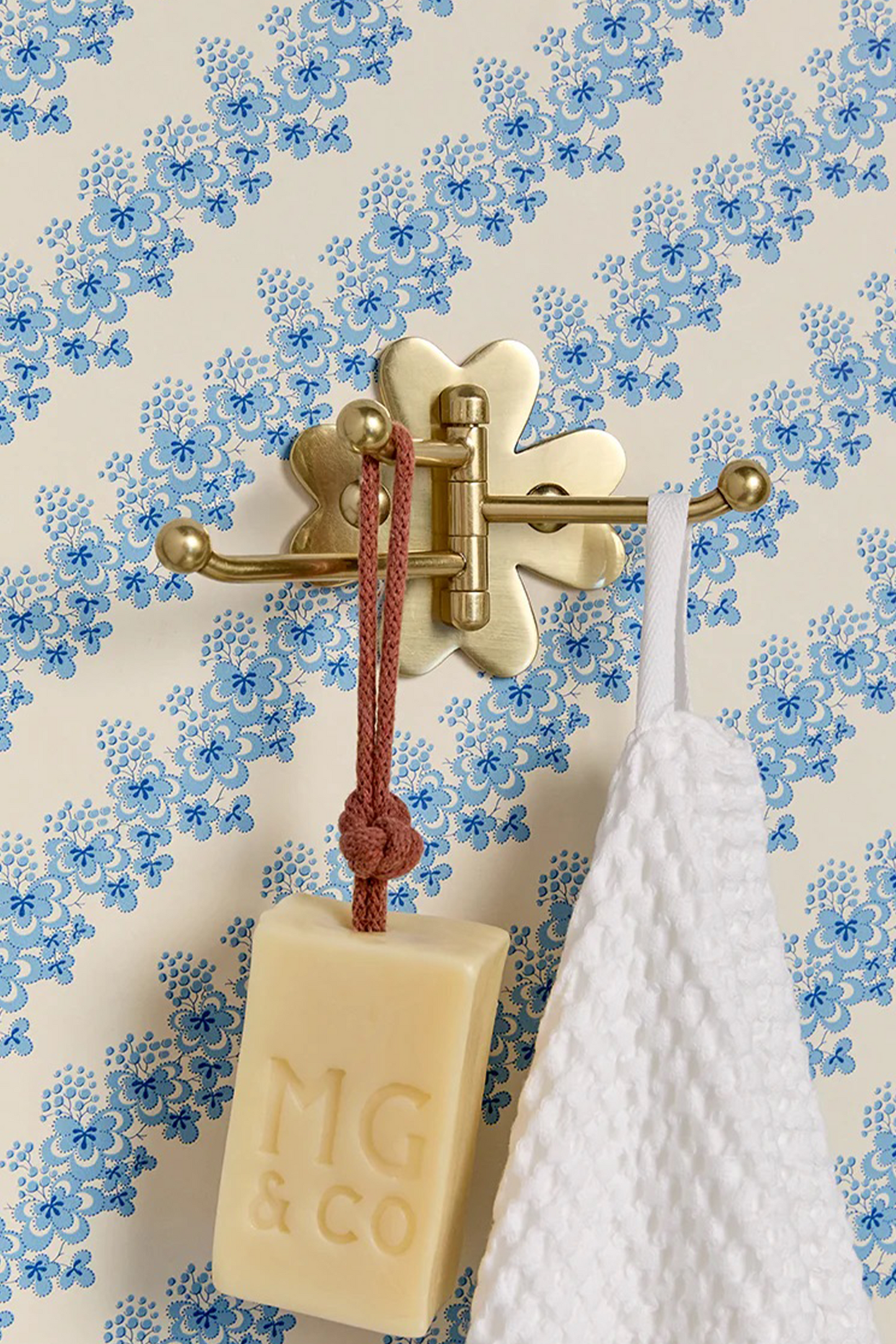 Clover Swing Arm Hook Aged Brass