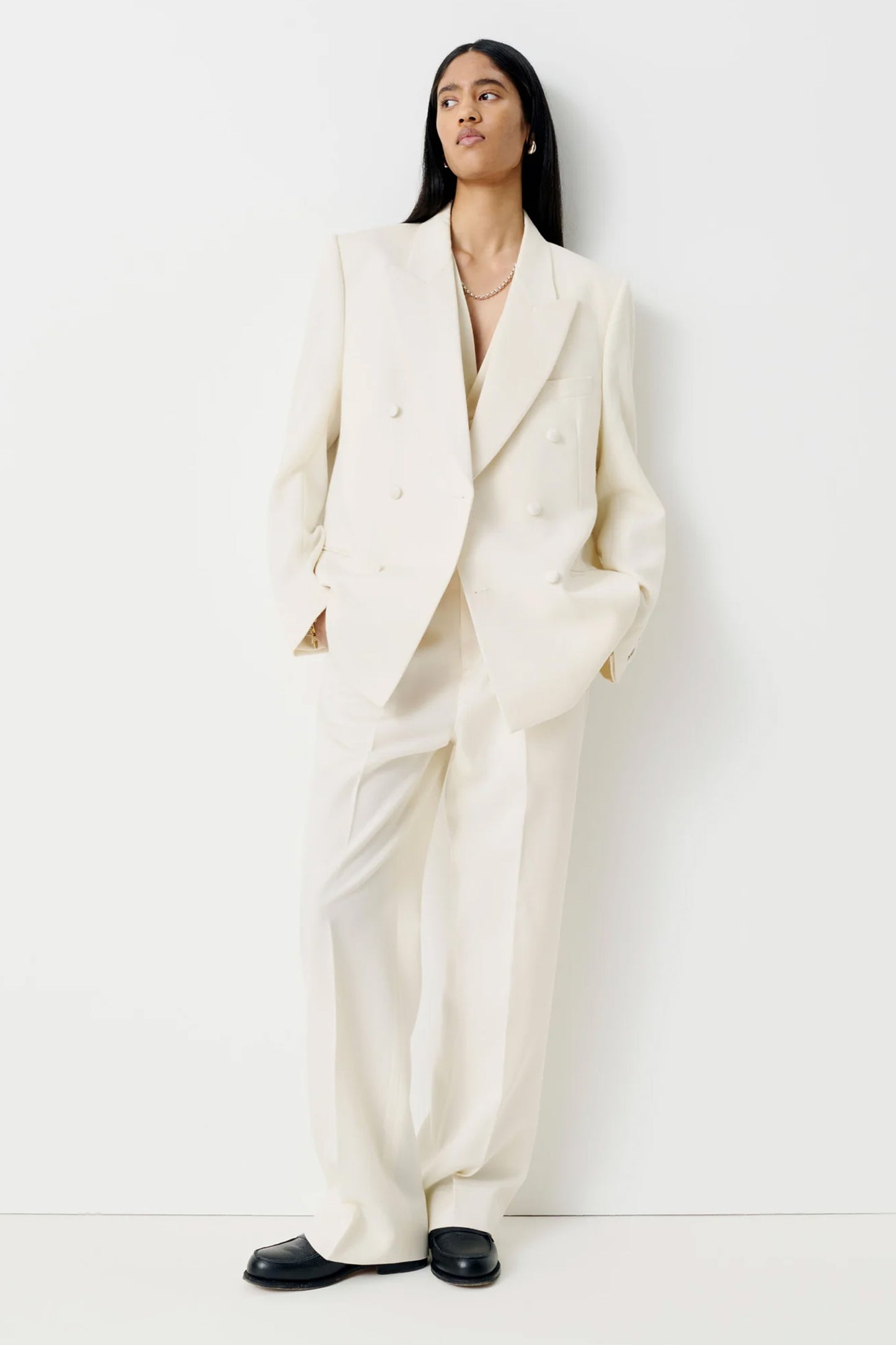 The White Tuxedo Jacket and Trousers
