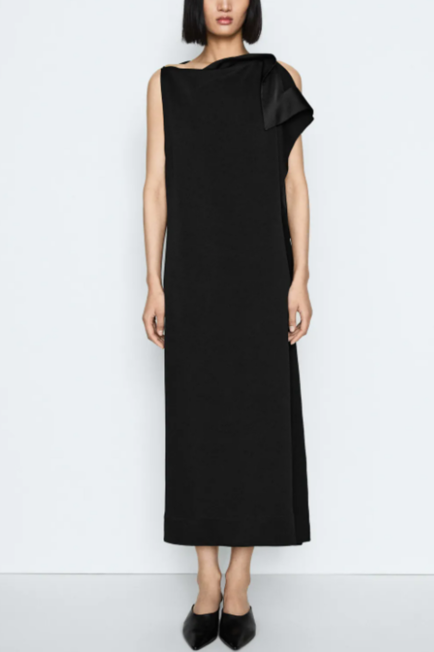 Flowing asymmetric dress with ruffle detail