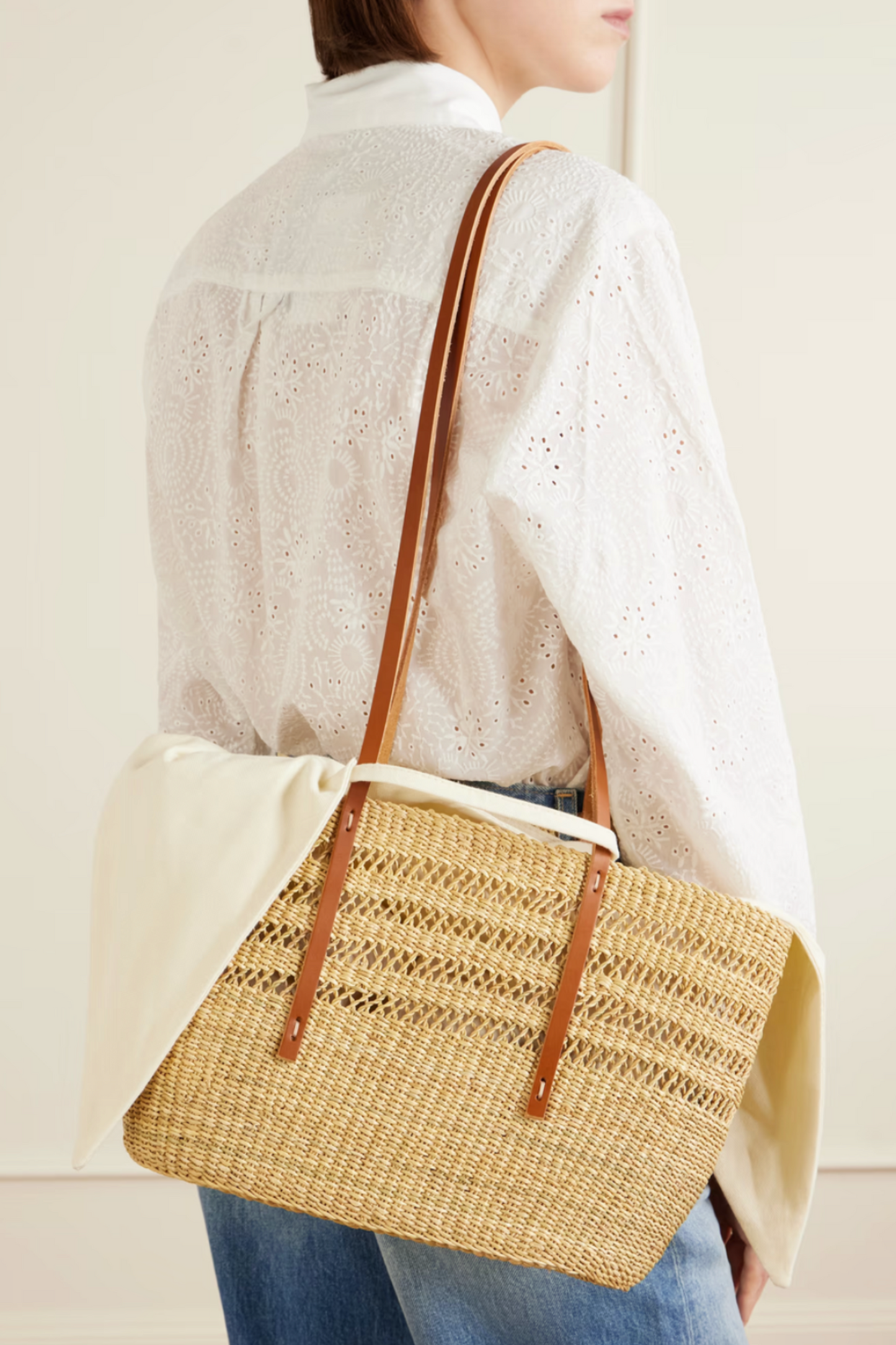 Bicro M leather-trimmed woven straw tote