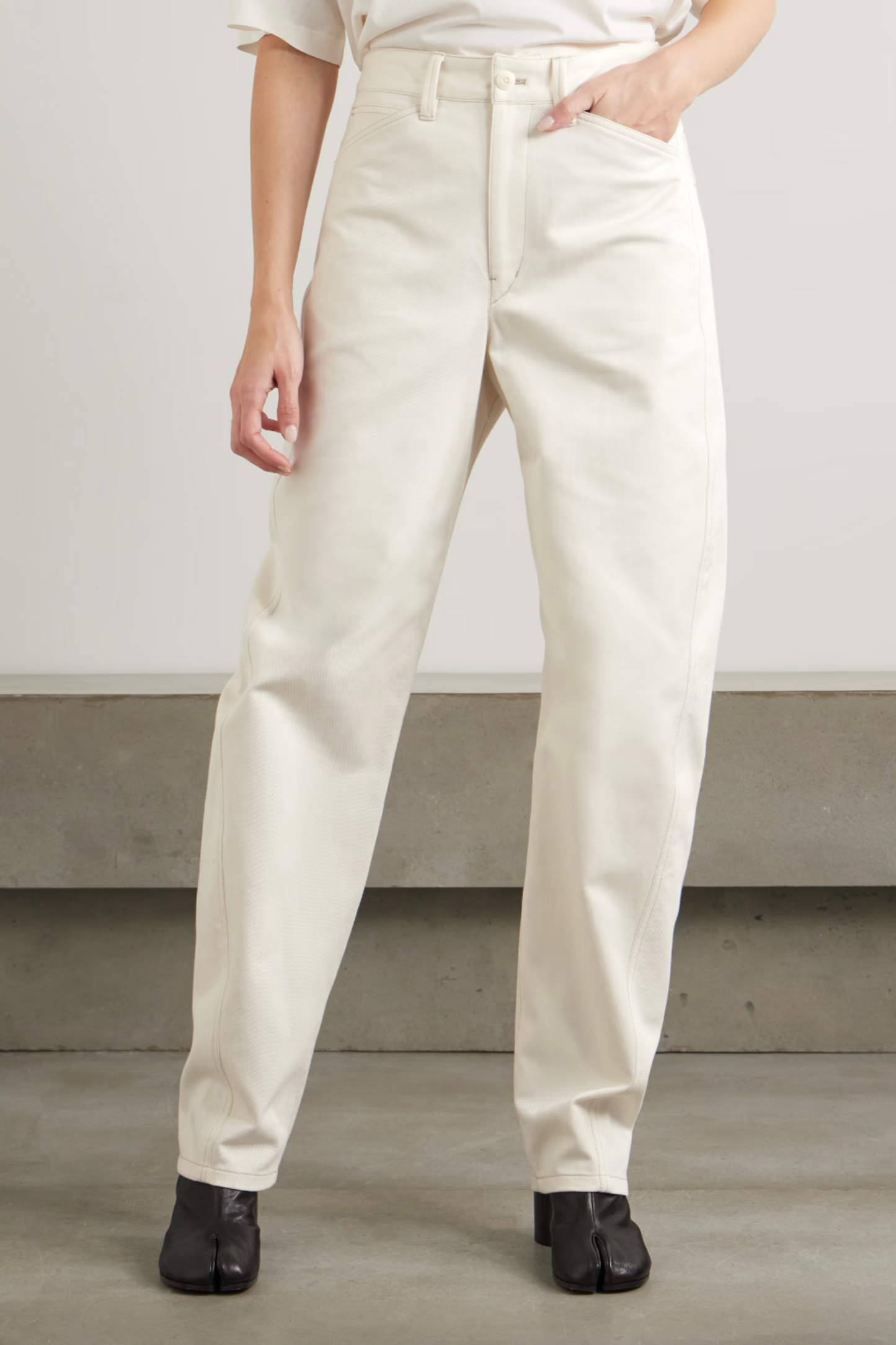 Twisted High-rise Barrel-leg Jeans