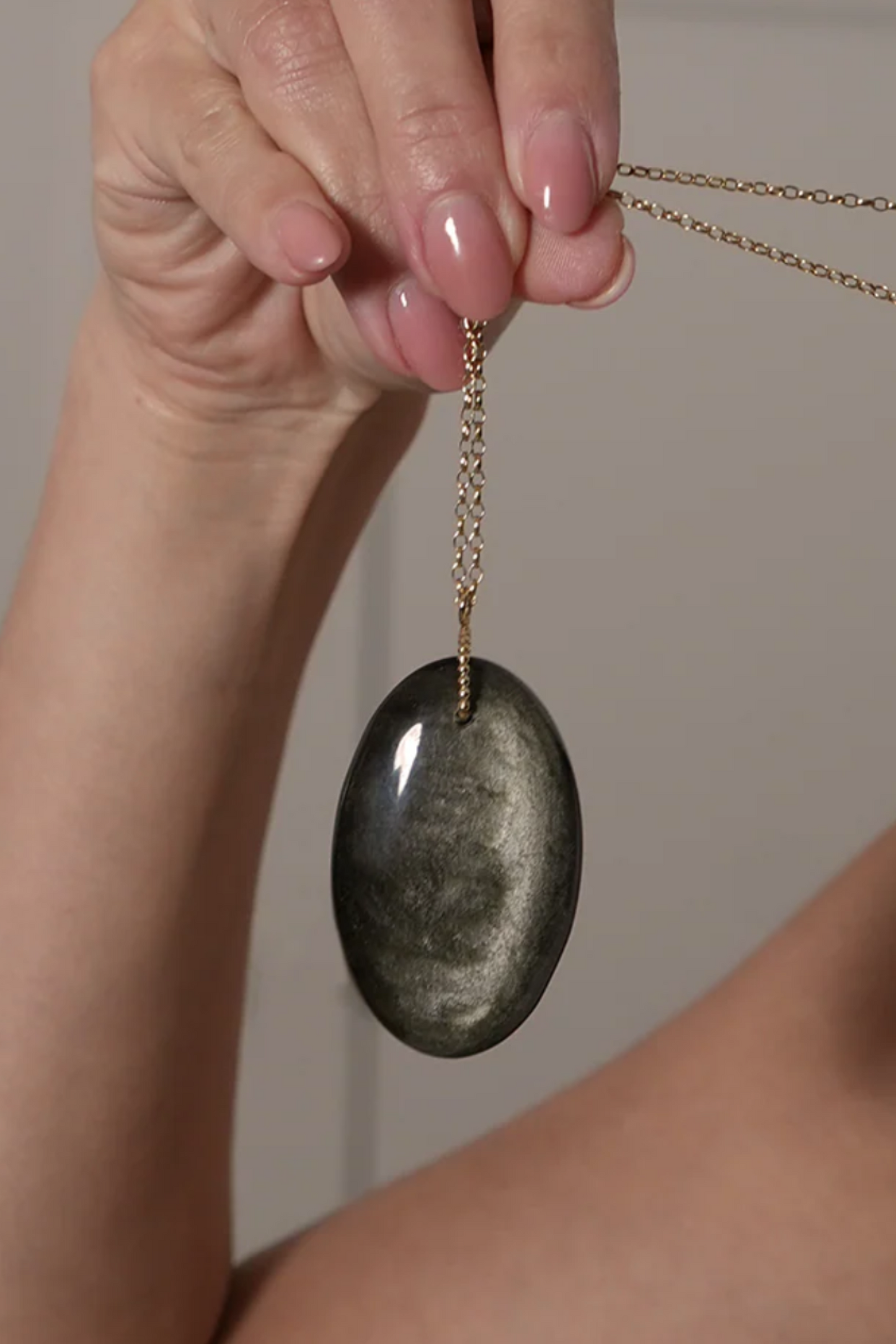 Raw Golden Obsidian Pebble Amulet