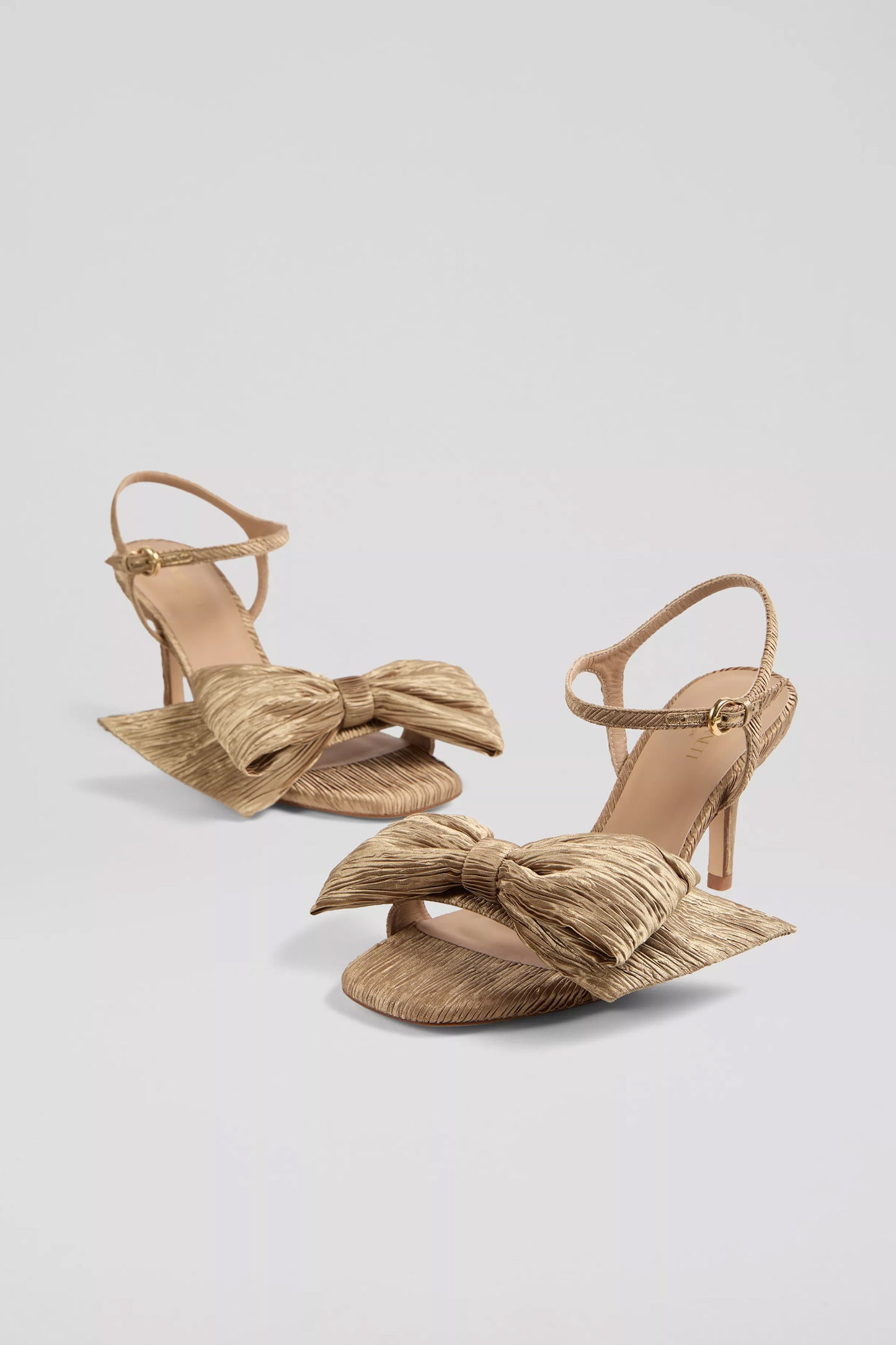 Roline Gold Bow Heel Sandals