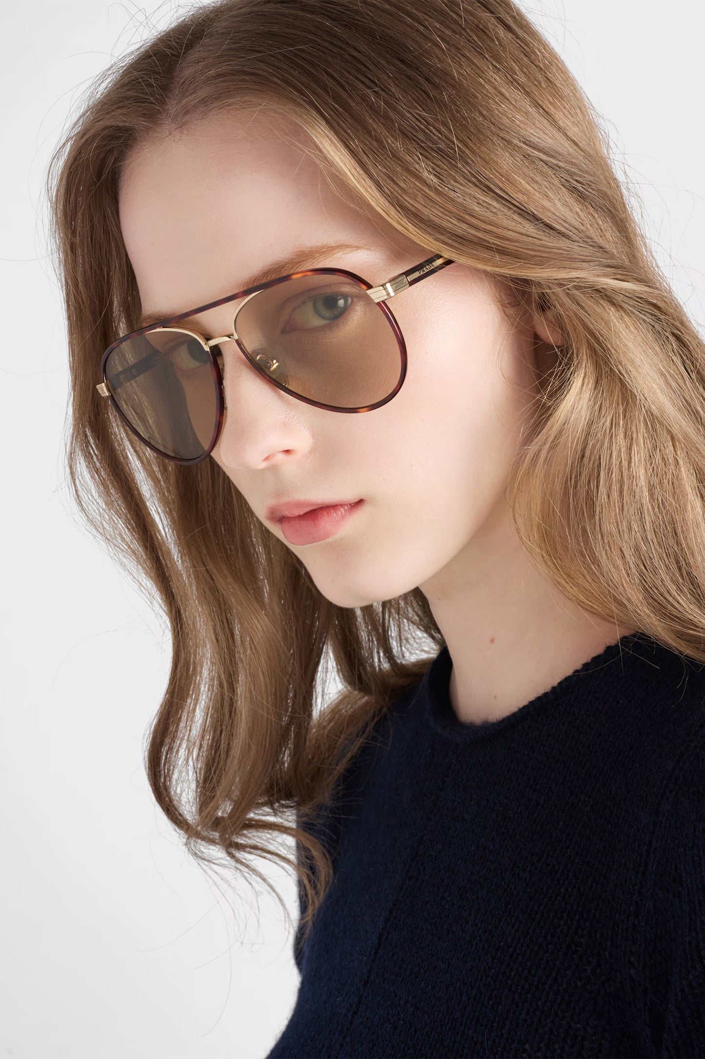 Sunglasses with the Iconic Metal Plaque