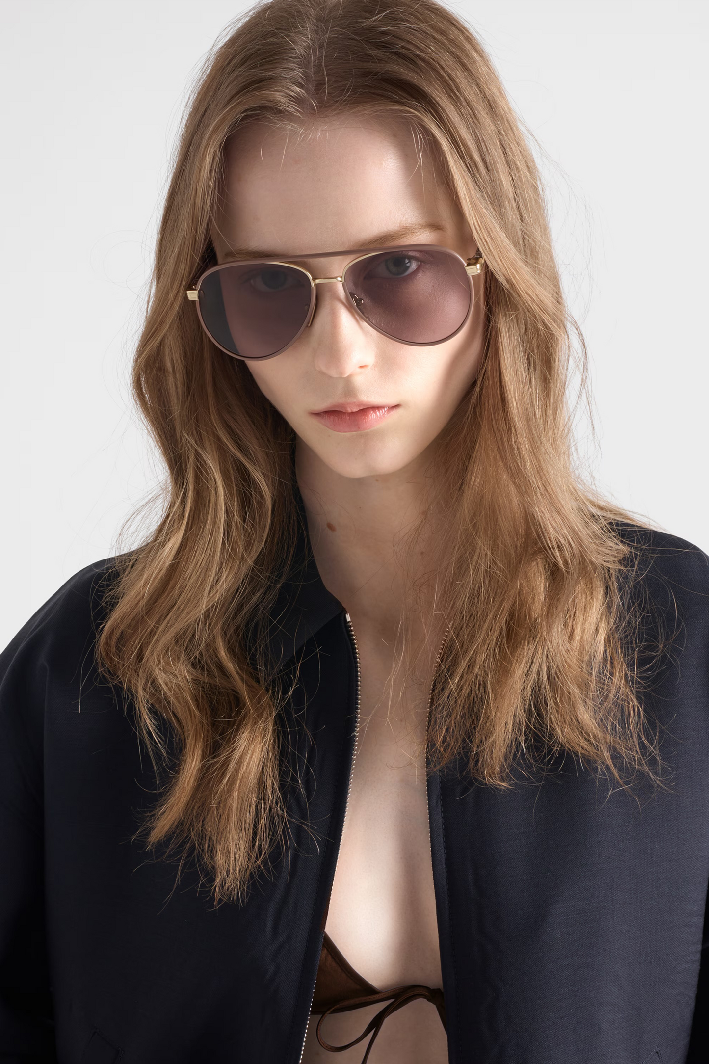 Sunglasses With The Iconic Metal Plaque