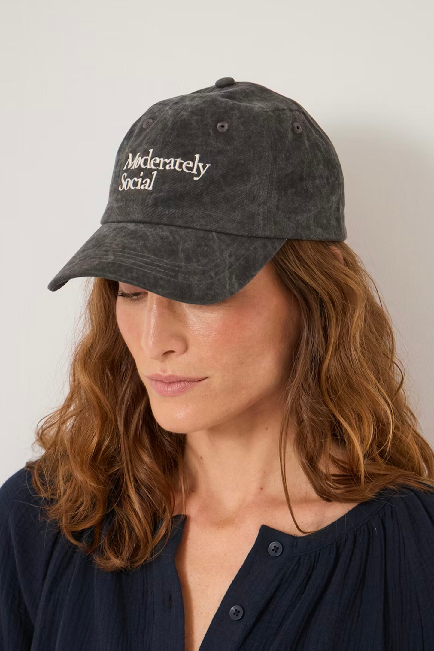 Moderately Social Cap