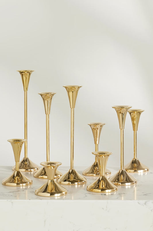 Puddle Set Of Nine Brass Candlesticks