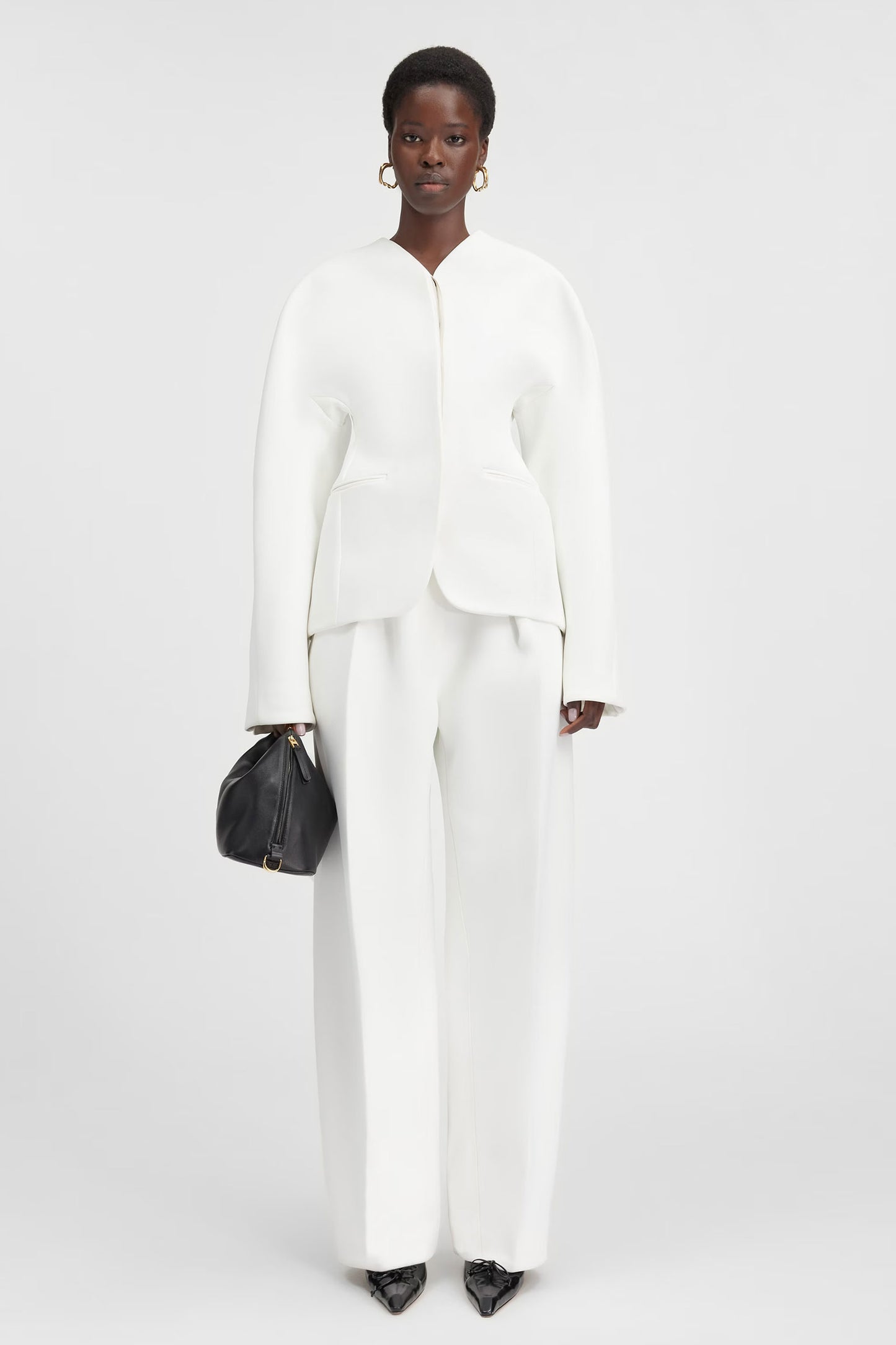 Fitted Jacket And Curved Pants